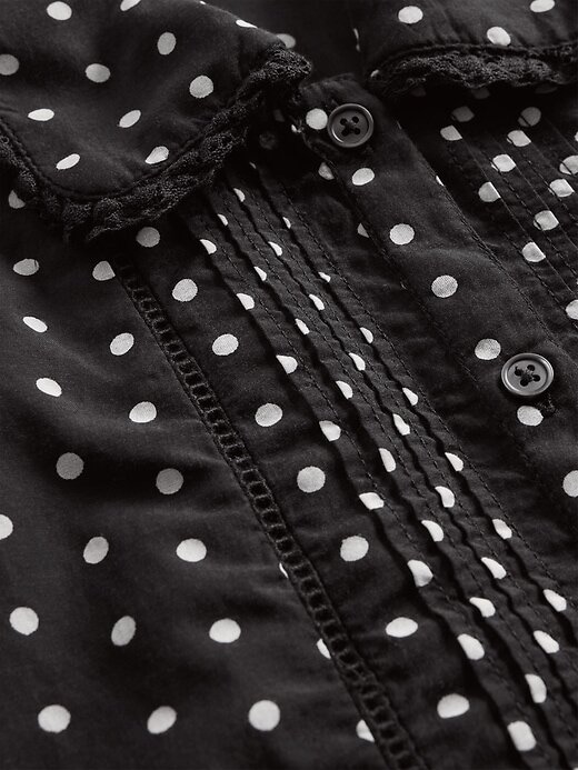 Blusa com gola e manga bufante Blusa com gola e manga bufante