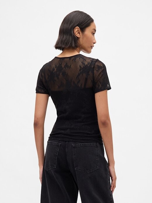 Blusa de malha com renda floral Blusa de malha com renda floral