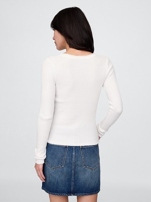 Blusa suéter Pointelle Henley Blusa suéter Pointelle Henley
