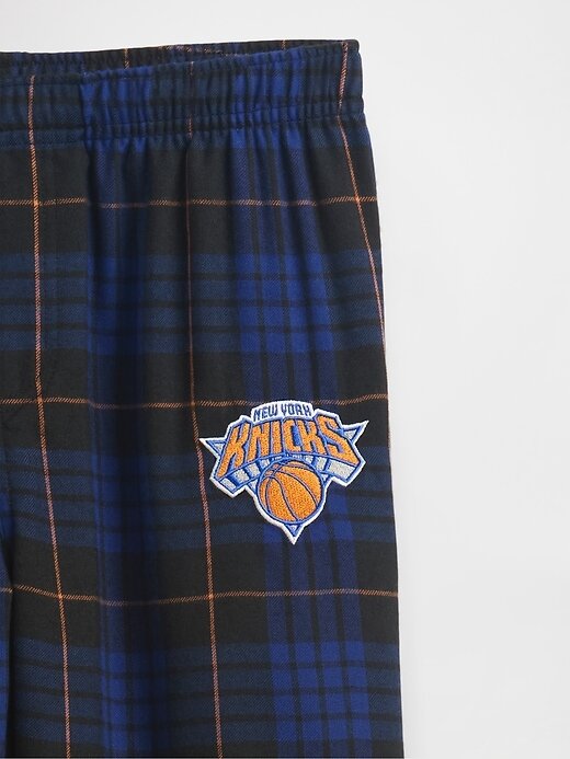 Calça de pijama de flanela infantil NBA New York Knicks Calça de pijama de flanela infantil NBA New York Knicks