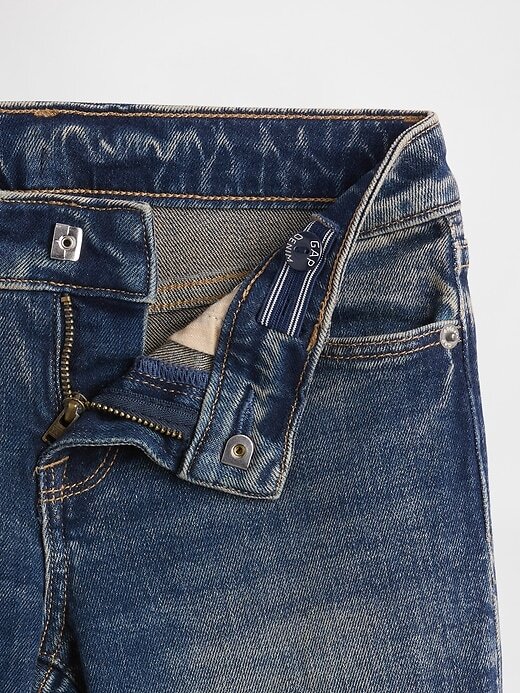 Calça jeans flare infantil de cintura baixa Calça jeans flare infantil de cintura baixa