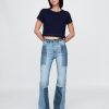 Calça jeans flare patchwork de cintura alta dos anos 70