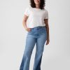 Calça jeans flare remendada de cintura alta dos anos 70