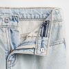 Calça jeans infantil de cintura alta e perna larga no tornozelo Calça jeans infantil de cintura alta e perna larga no tornozelo