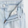 Calça jeans infantil de cintura baixa com costura e perna larga Calça jeans infantil de cintura baixa com costura e perna larga