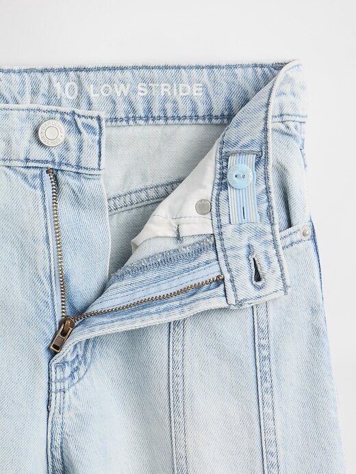 Calça jeans infantil de cintura baixa com costura e perna larga Calça jeans infantil de cintura baixa com costura e perna larga