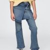 Calça jeans infantil flare com saia envelope