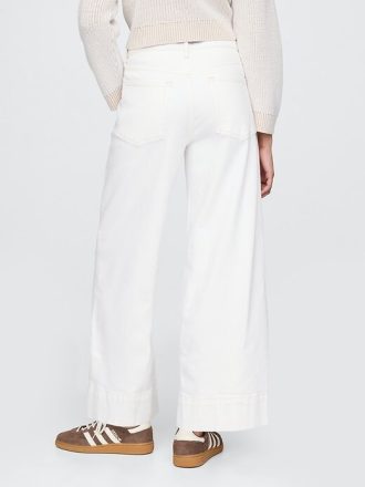 Calça jeans larga de cintura alta com strass e perna larga