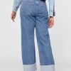Calça jeans larga dos anos 90 com cintura média e punho