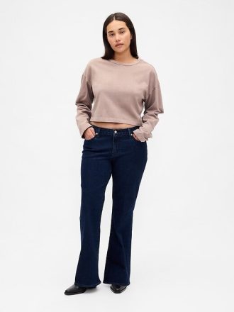 Calça jeans longa e justa com cintura baixa e curvas