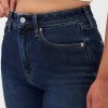 Calça jeans reta e justa curvilínea de cintura alta dos anos 90
