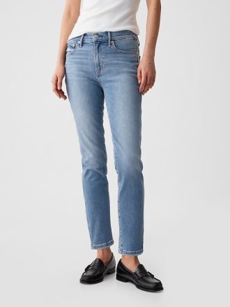 Calça jeans vintage slim com cintura média e bainha dividida