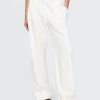 Calças de linho com bainha larga