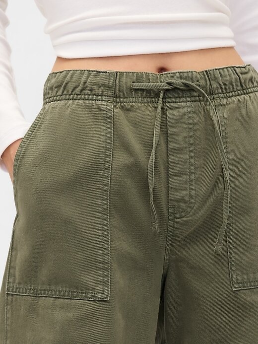 Calças largas de cintura média Calças largas de cintura média