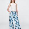 Calças largas infantis ultramacias em jeans tie-dye