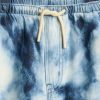 Calças largas infantis ultramacias em jeans tie-dye