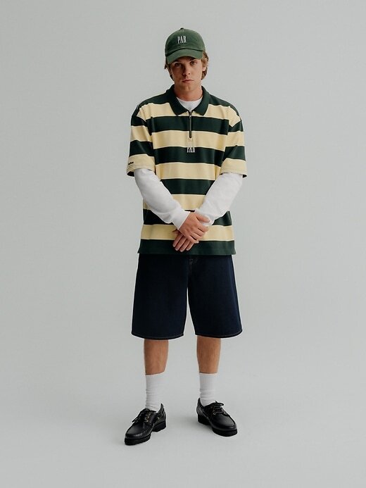 Camisa polo listrada com logotipo Gap × Malbon Camisa polo listrada com logotipo Gap × Malbon