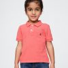 Camisa polo piquê para bebês e crianças pequenas