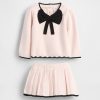 Conjunto de saia-suéter com laço para bebê