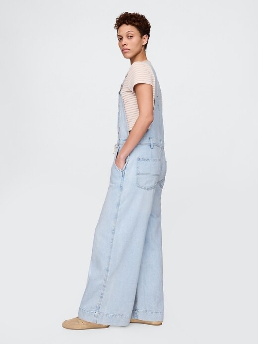 Macacão jeans largo ultramacio Macacão jeans largo ultramacio