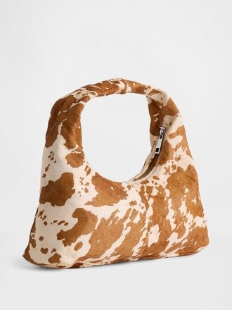 Mini bolsa larga com estampa de vaca e pelo de bezerro