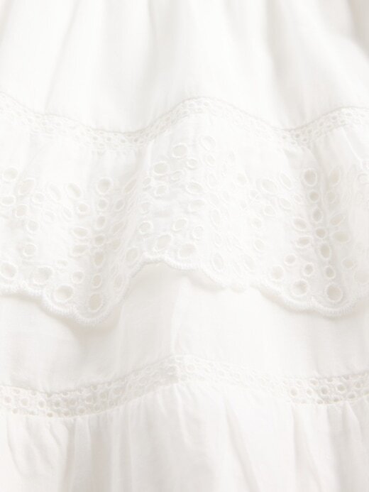 Mini saia-saia com babados e ilhós Mini saia-saia com babados e ilhós