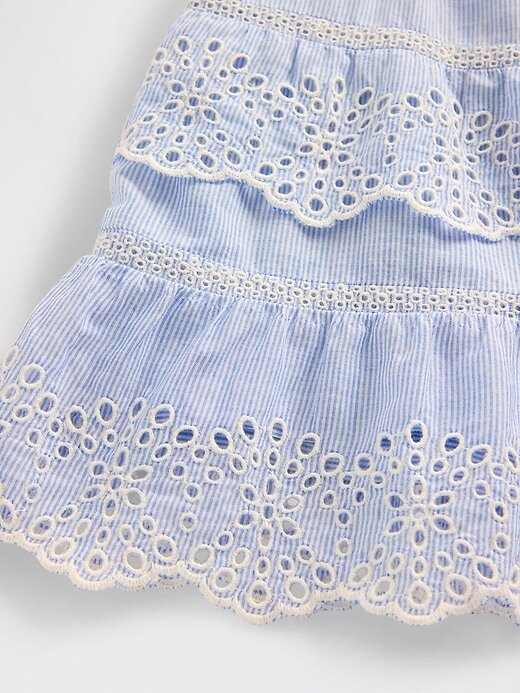 Mini saia-saia com babados e ilhós Mini saia-saia com babados e ilhós