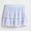 Mini saia-saia com babados e ilhós Mini saia-saia com babados e ilhós