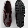 Mocassins infantis com tiras em T