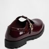 Mocassins infantis com tiras em T