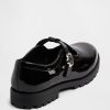 Mocassins infantis com tiras em T