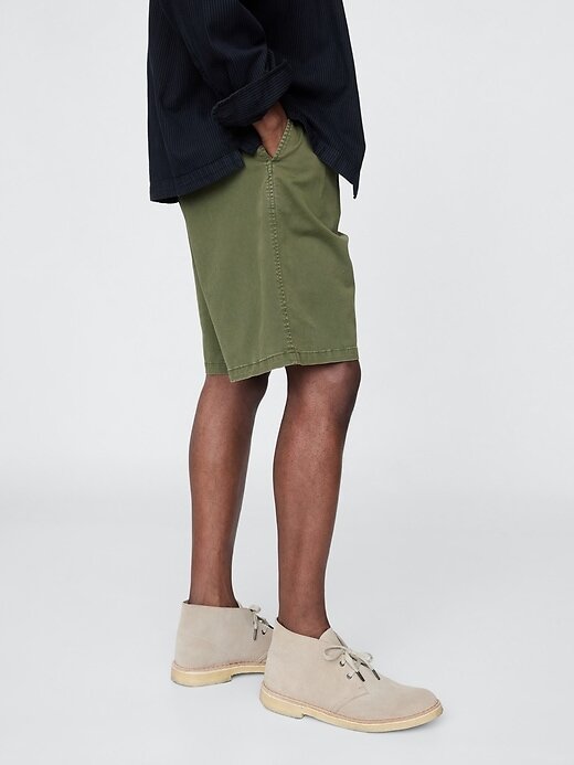 Shorts cáqui plissados Shorts cáqui plissados