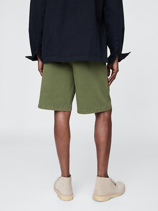 Shorts cáqui plissados Shorts cáqui plissados