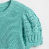 Suéter infantil com ponto misto e vieira