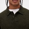 Suéter polo de lã merino