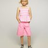 Top infantil de popeline peplum