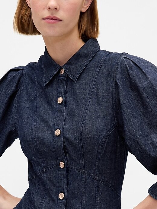 Vestido curto jeans com manga bufante e costura Vestido curto jeans com manga bufante e costura